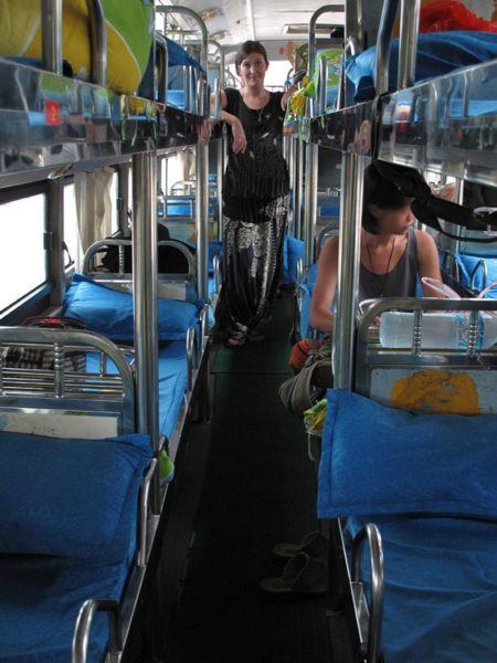 Claire of Old World Wandering on a sleeper bus to China