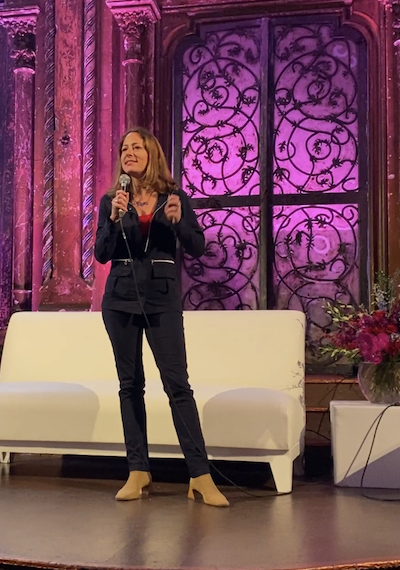 Nora Dunn speaking at Women's Travel Fest 2023
