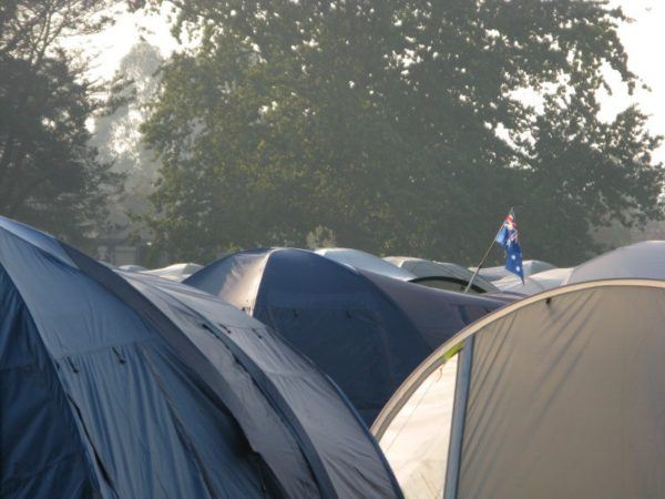 Australian flag amid tents in the midst of a Victoria bush fire disaster