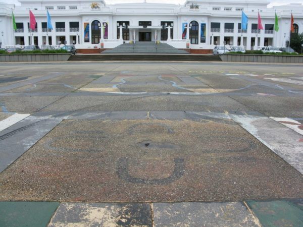 In front of the parliament building in Canberra Australia, at the site of the original protest fire 