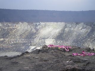 flower offerings at the mouth of a gigantic volcanic crater in Volcano National Park