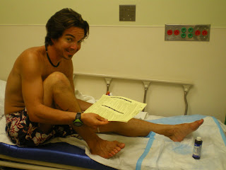 Sitting in on a bed in the emergency room with a "broken" toe
