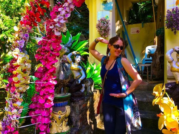 Posing with a statue in Chiang Mai Thailand in 2018
