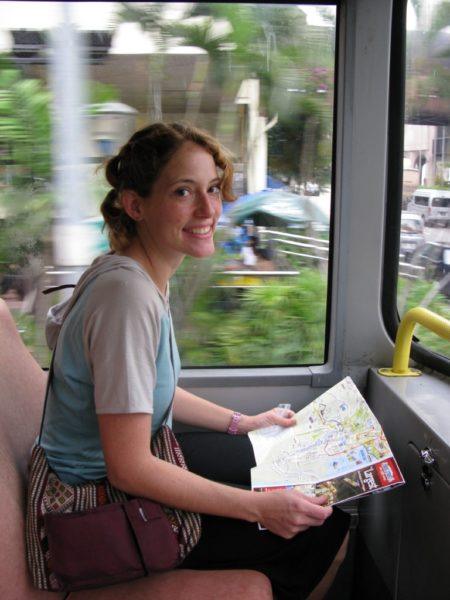 The Professional Hobo, Navigating the bus in Singapore; you can't see the travel fatigue, but it's there. 