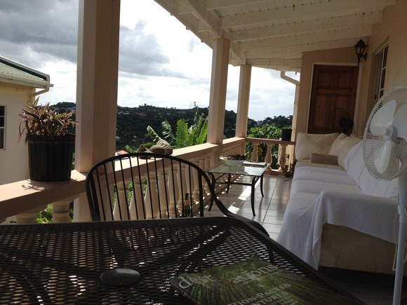 Listening to the sounds of Grenada from my porch