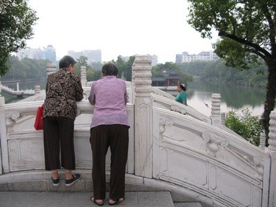 women by the riverside