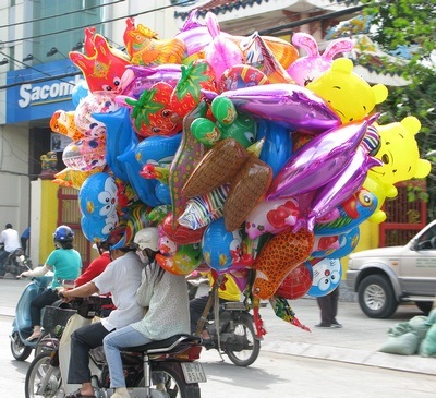 riding with balloons