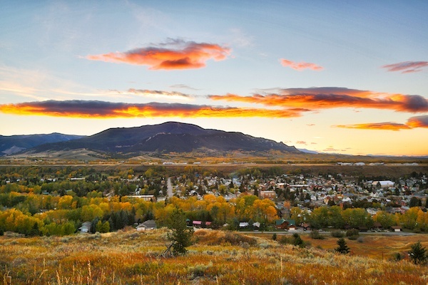 Red Lodge Montana - sunset over the town with mountain behind it